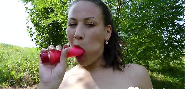  Beautiful stepdaughter masturbates with a toy outdoors